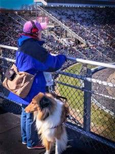 Kolby watching race, Amelia watching crowd.