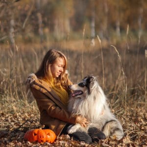 girl with blue merle rough collie